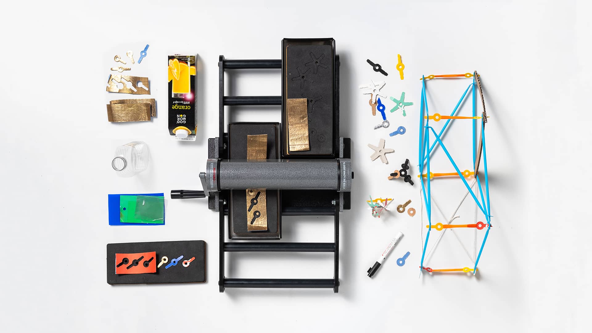 Sustainability Station, a die cutting machine to make infinite amounts of connectors from found waste material.